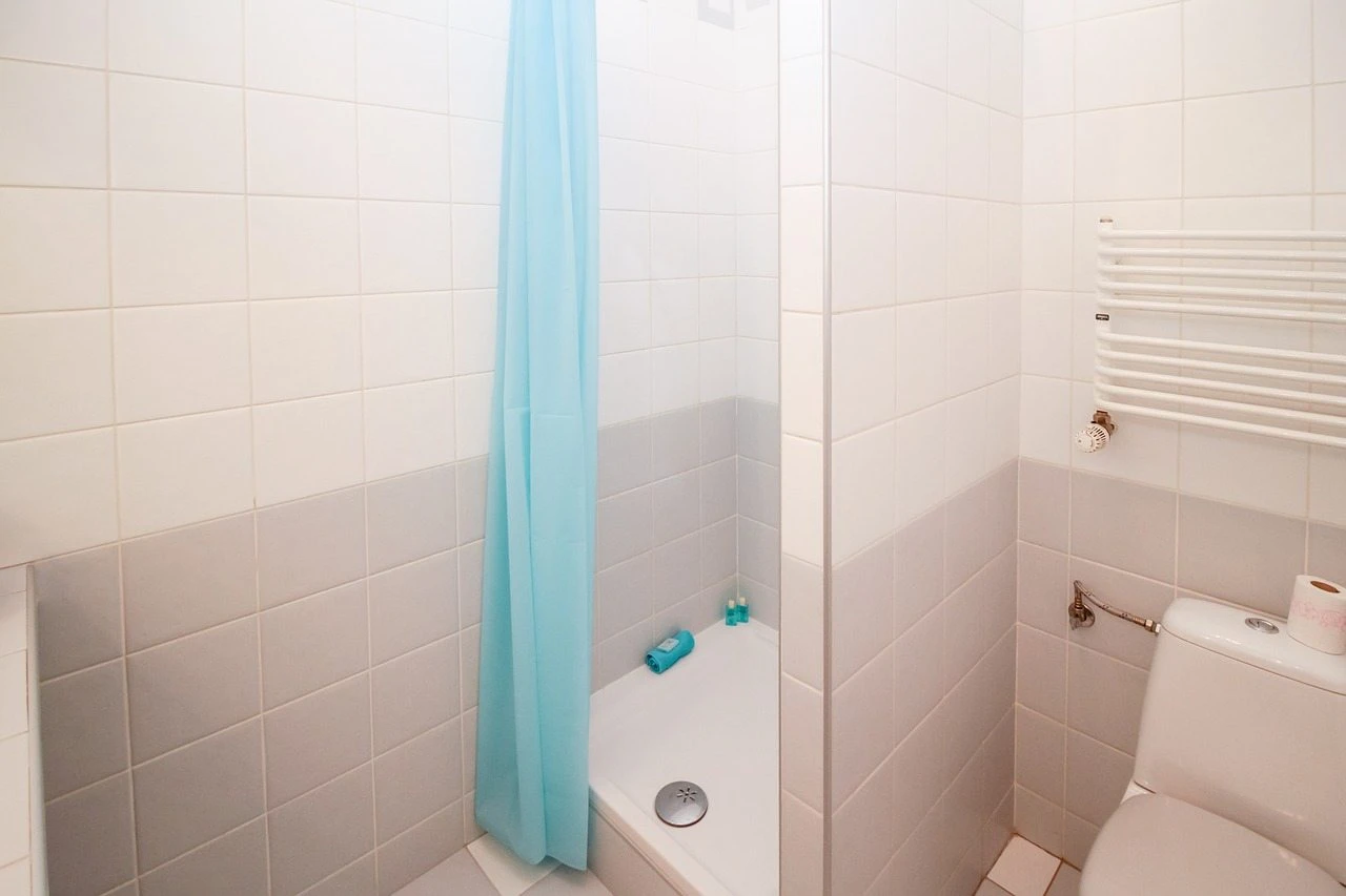 Do You Have A Fiberglass Shower Pan Making Your House Look Bad?