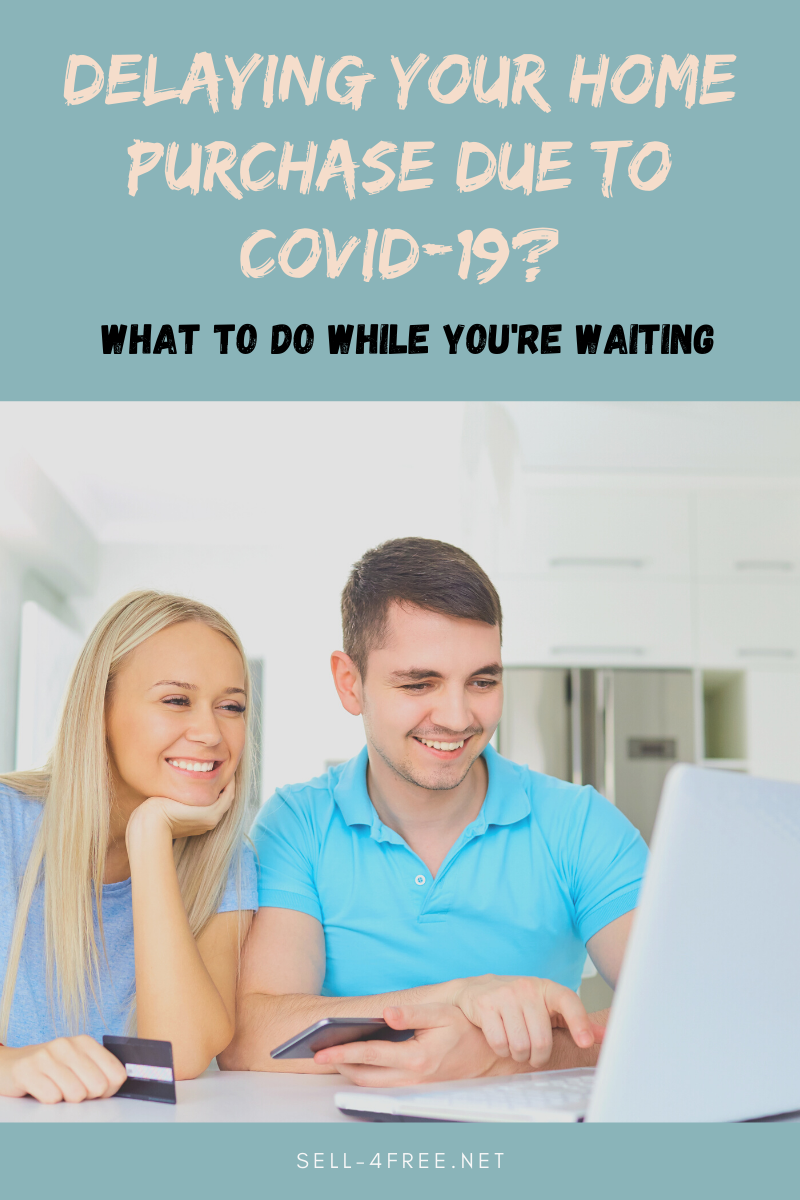 Man and woman siting at a desk looking at a laptop with words Delaying Your Home Purchase due to Covid-19 (Coronavirus)? What to Do While You're Waiting